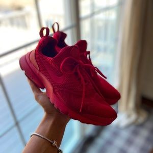 Cherry red Nike trainers